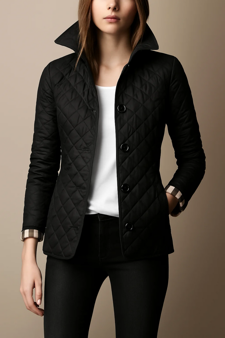 Woman wearing black quilted jacket with stand collar